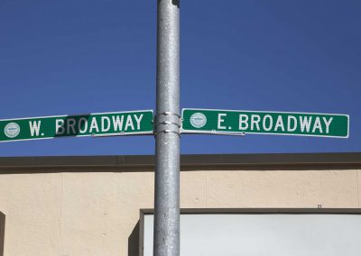 west broadway and east broadway road signs